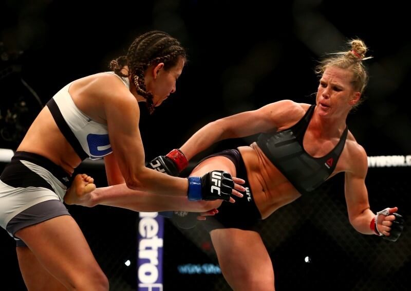 March 5, 2016; Las Vegas, NV, USA; Holly Holm lands a kick against Miesha Tate during UFC 196 at MGM Grand Garden Arena. Mandatory Credit: Mark J. Rebilas-USA TODAY Sports