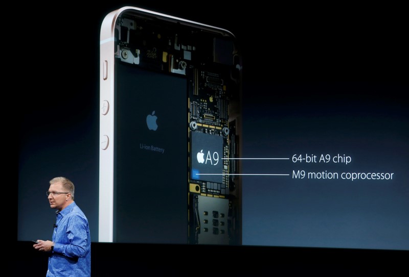Apple Vice President Greg Joswiak introduces the iPhone SE during an event at the Apple headquarters in Cupertino, California March 21, 2016. REUTERS/Stephen Lam