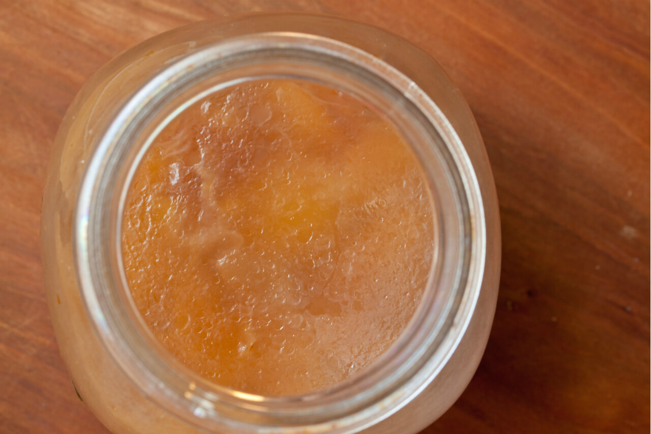 A “mother” begins to form in my peach skin vinegar. Credit: Copyright 2015 Susan Lutz