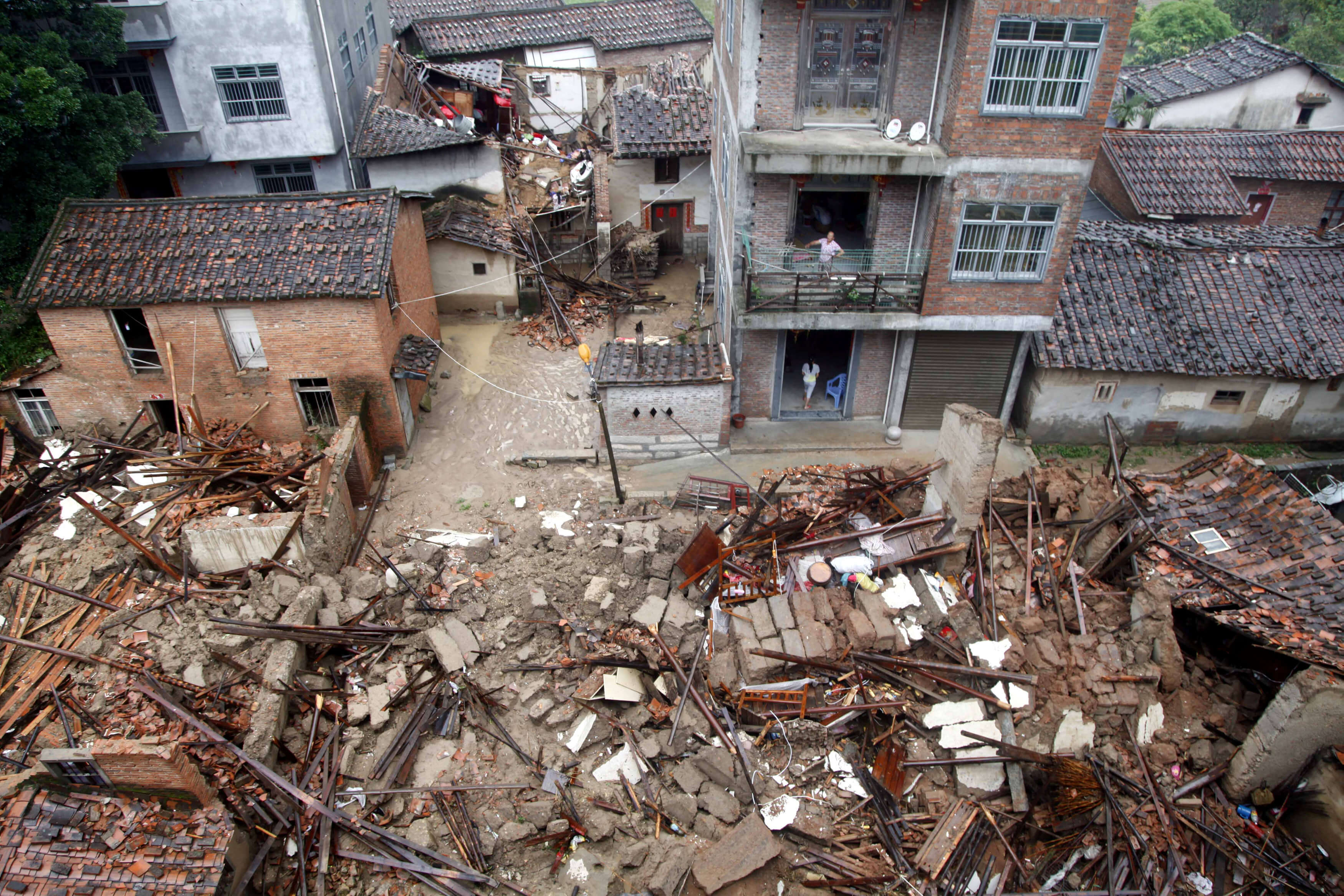 Damaged and collapsed buildings are seen as Typhoon Nepartak brings heavy rainfall in Putian, Fujian Province, China, July 9, 2016. REUTERS/Stringer