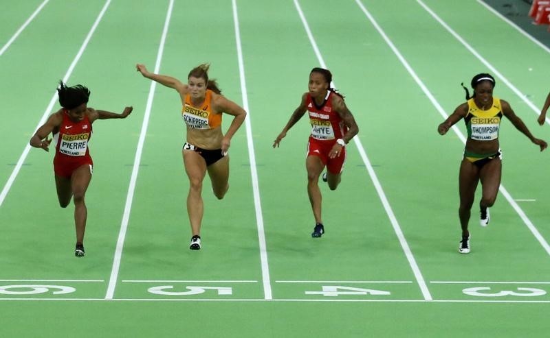 Barbara Pierre of the U.S. (L) wins the women's 60 meters final past Dafne Schippers of the Netherlands (2nd from L) during the IAAF World Indoor Athletics Championships in Portland, Oregon March 19, 2016.     REUTERS/Lucy Nicholson -