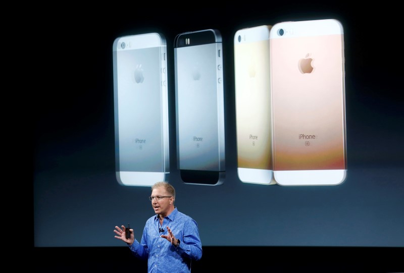 Apple Vice President Greg Joswiak introduces the iPhone SE during an event at the Apple headquarters in Cupertino, California March 21, 2016. REUTERS/Stephen Lam