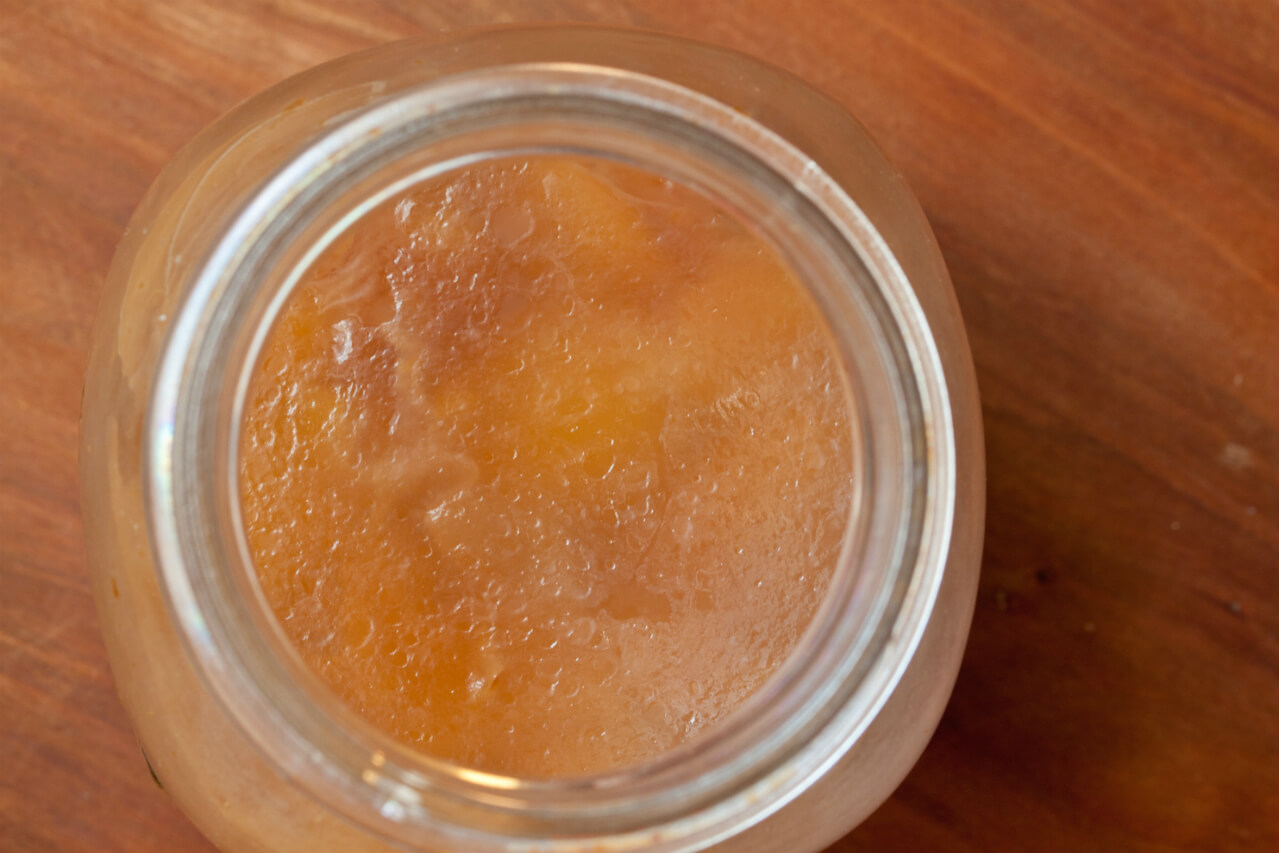 A “mother” begins to form in my peach skin vinegar. Credit: Copyright 2015 Susan Lutz