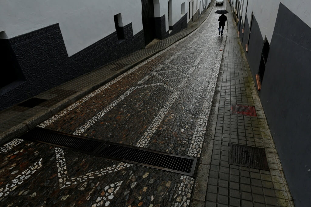 A man walks in Jabugo, southern Spain May 12, 2016. REUTERS/Marcelo del Pozo